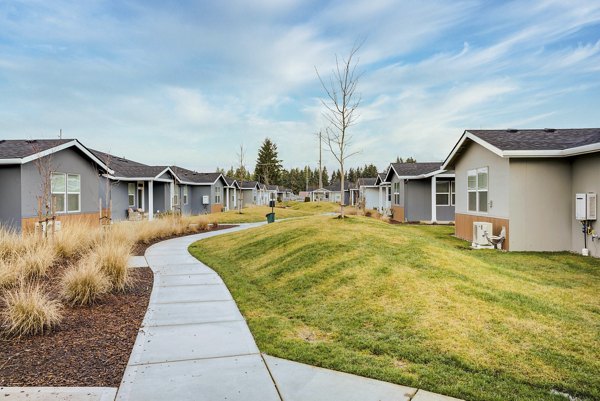 Villas at 28th: Scenic view of luxury apartments with landscaped gardens