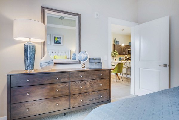 Cozy bedroom featuring elegant furnishings at Incline at Anthem Apartments