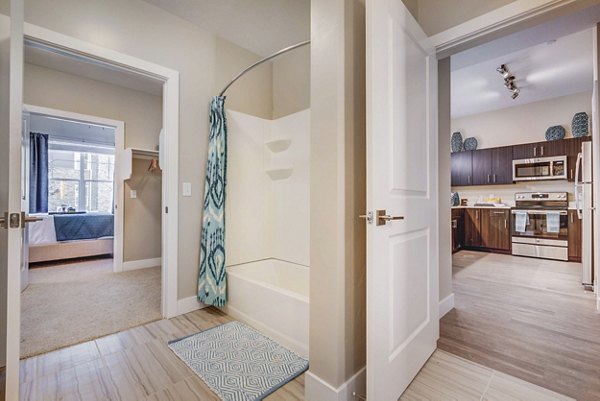 Bathroom featuring sleek design and modern fixtures at Incline at Anthem Apartments