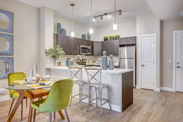 Dining room featuring modern decor and elegant lighting at Incline at Anthem Apartments in luxury community