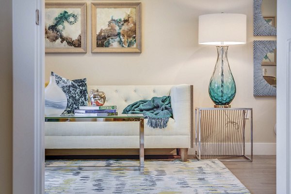 Spacious living room with modern decor at Incline at Anthem Apartments