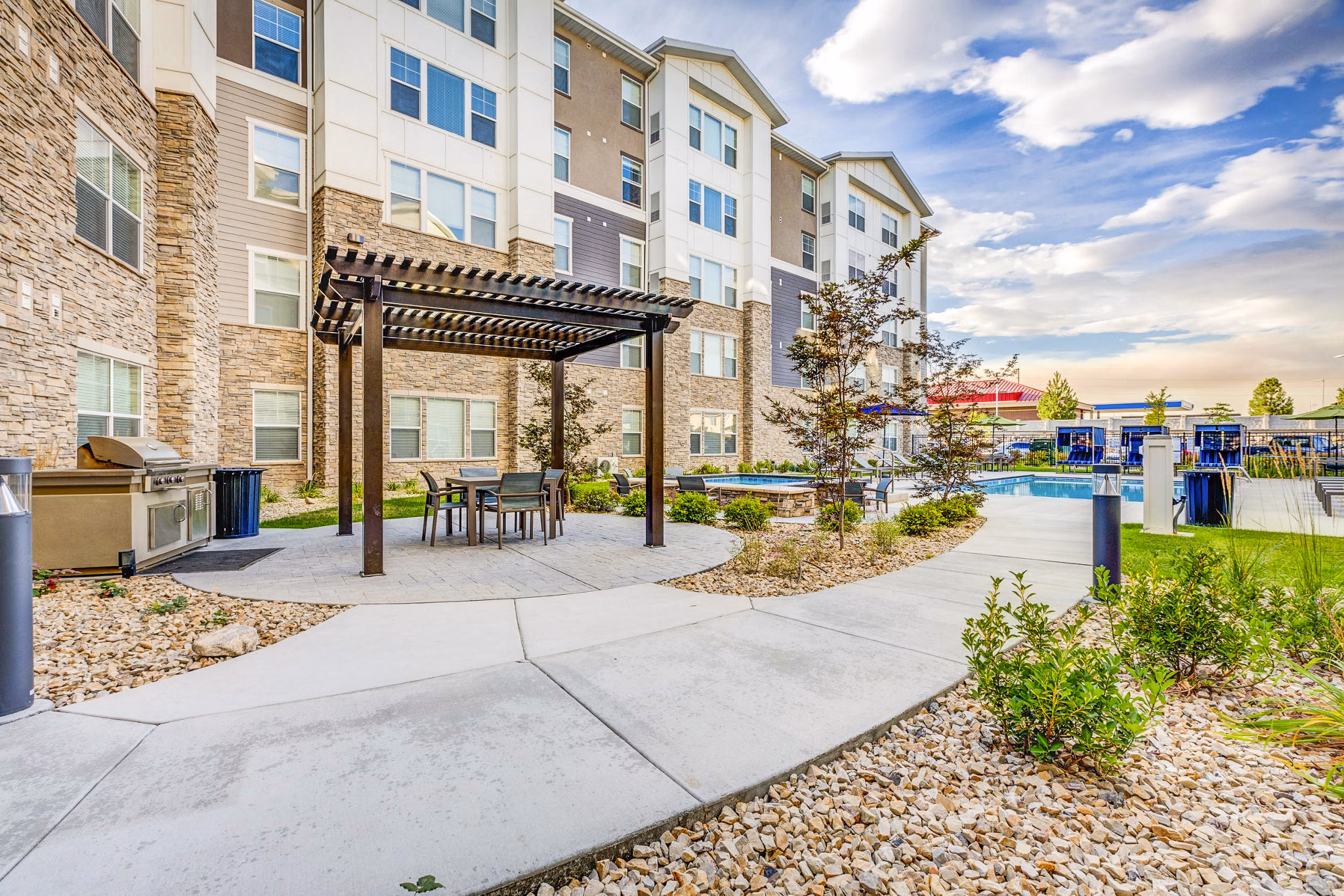 Outdoor grill area and patio at Incline at Anthem Apartments, perfect for entertaining and dining in a luxury atmosphere