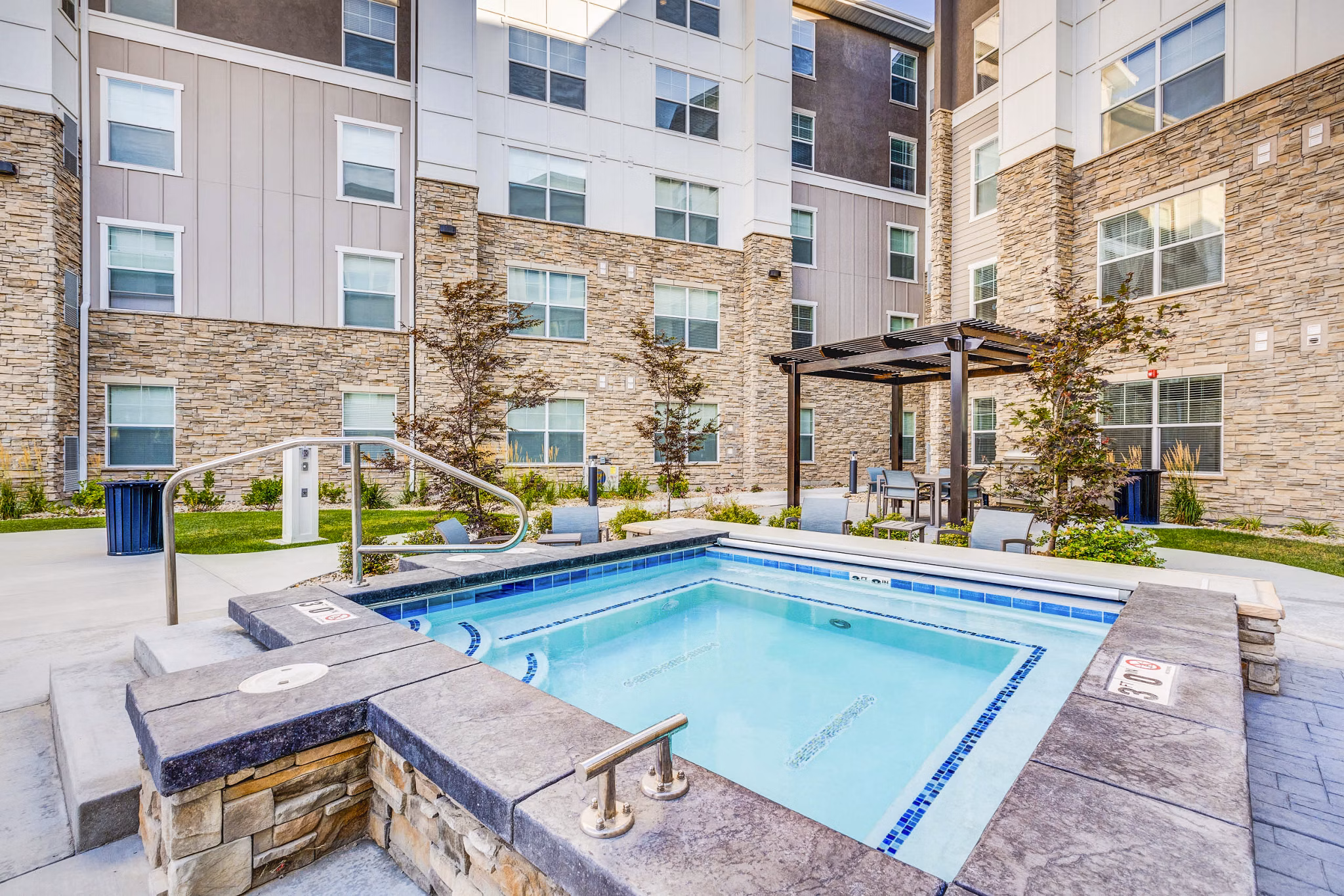 Resort-style pool with sundeck at Incline at Anthem Apartments
