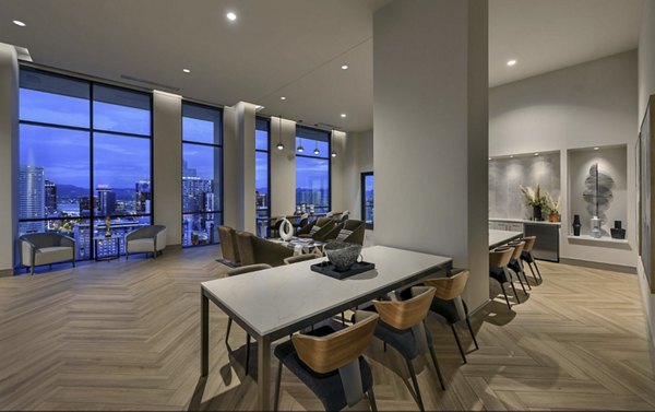 Clubhouse with modern seating and entertainment area at Derby Apartments