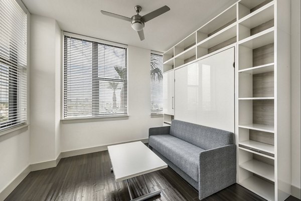 Cozy living room with modern decor at Derby Apartments, showcasing luxury features designed for comfort and style