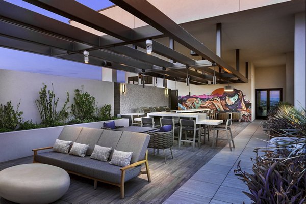 Serene courtyard with lush landscaping at Derby Apartments, a luxury Greystar community