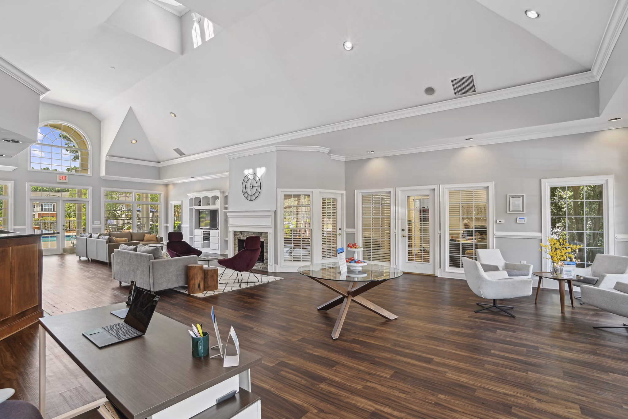 Modern clubhouse with spacious seating at The Vinings at Duncan Chapel Apartments for social gatherings and events