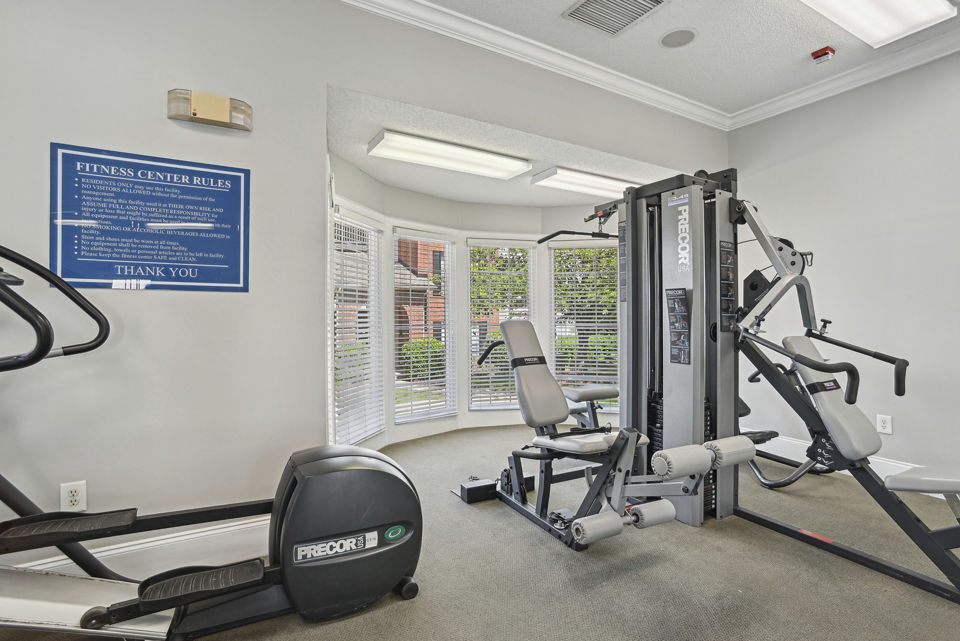 Modern fitness center featuring state-of-the-art equipment at The Vinings at Duncan Chapel Apartments