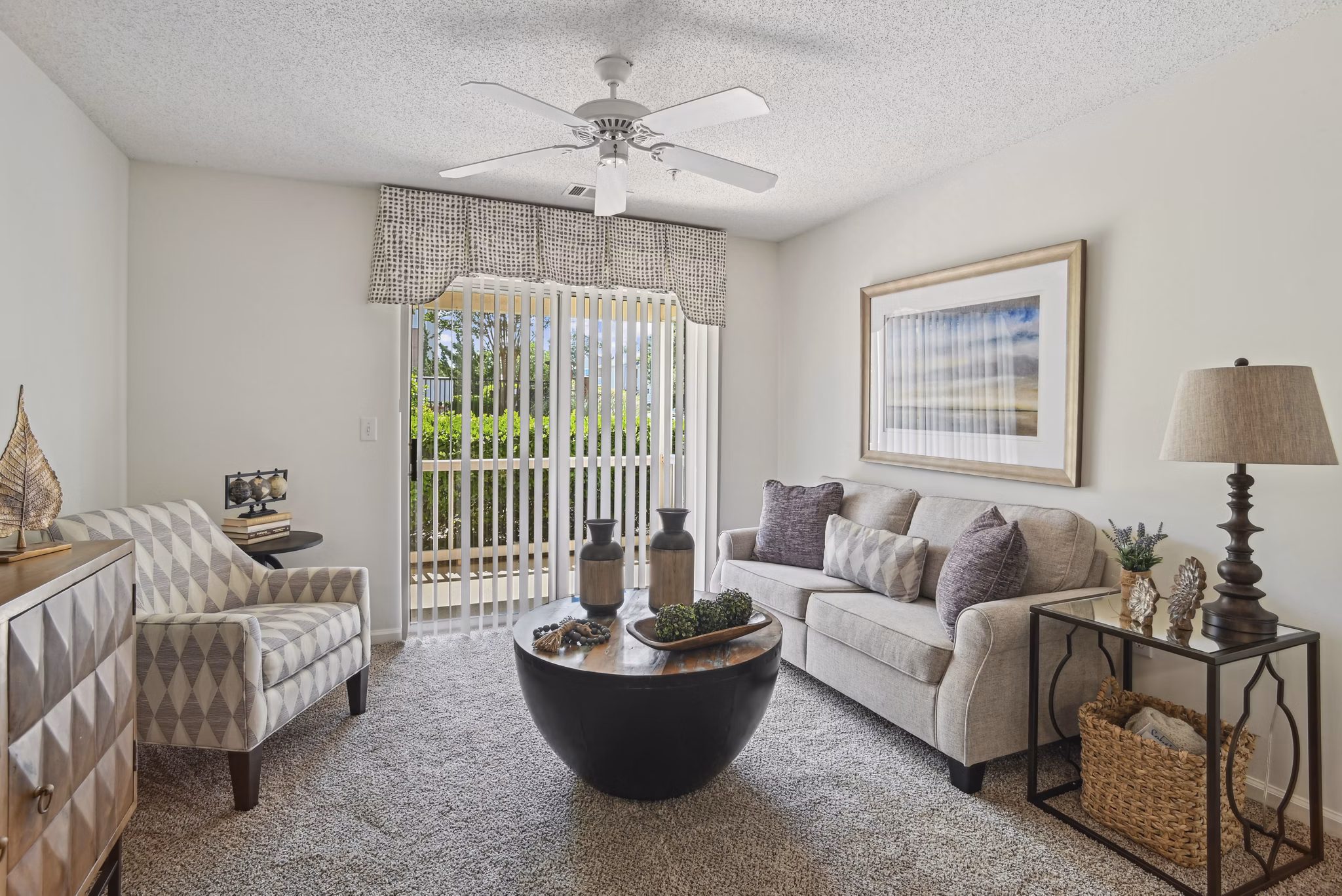 Bright living room with modern decor at The Vinings at Duncan Chapel Apartments