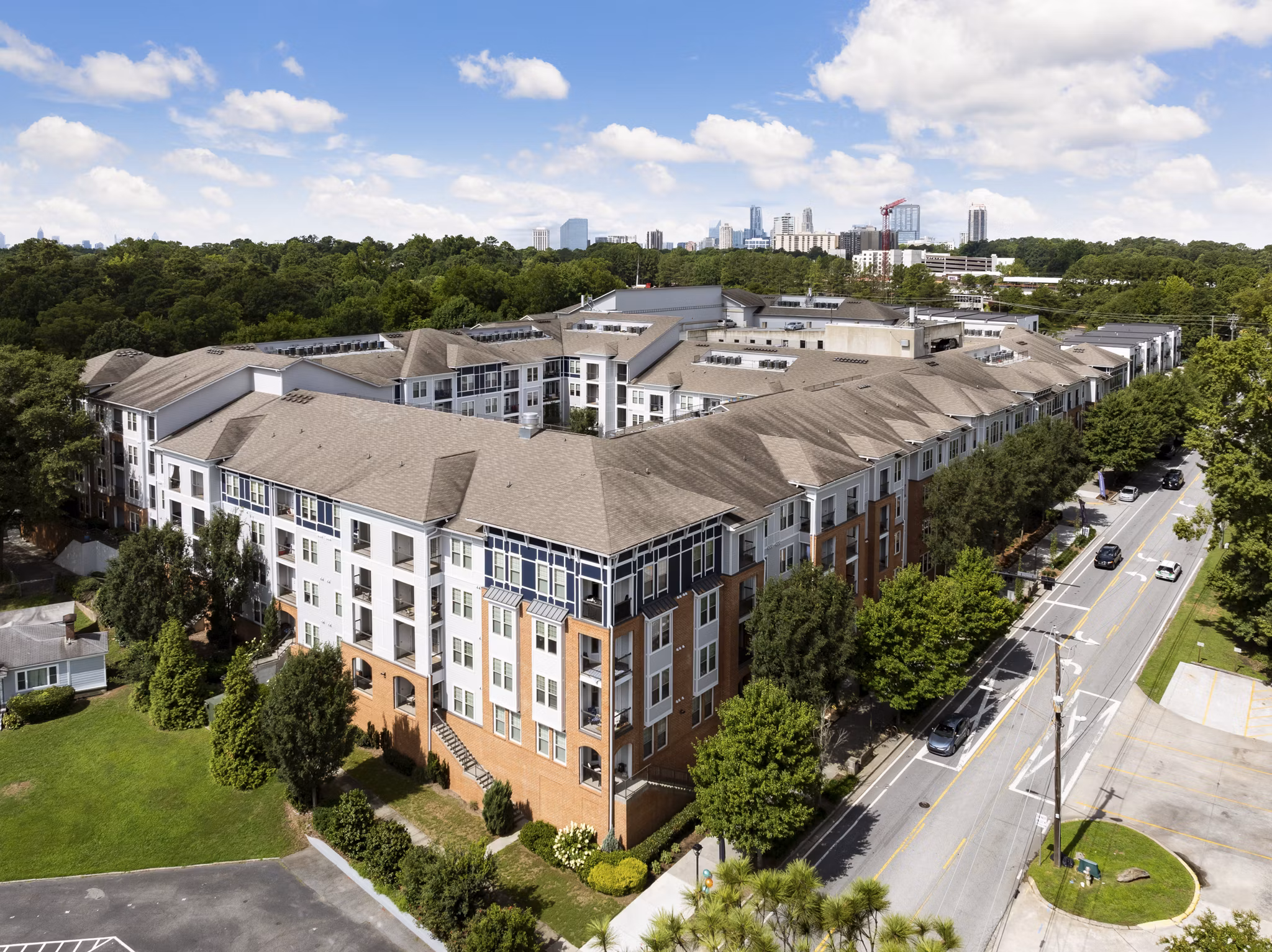 Elegant clubhouse with contemporary furnishings at Avanti Brookhaven Apartments, ideal for social gatherings and resident events