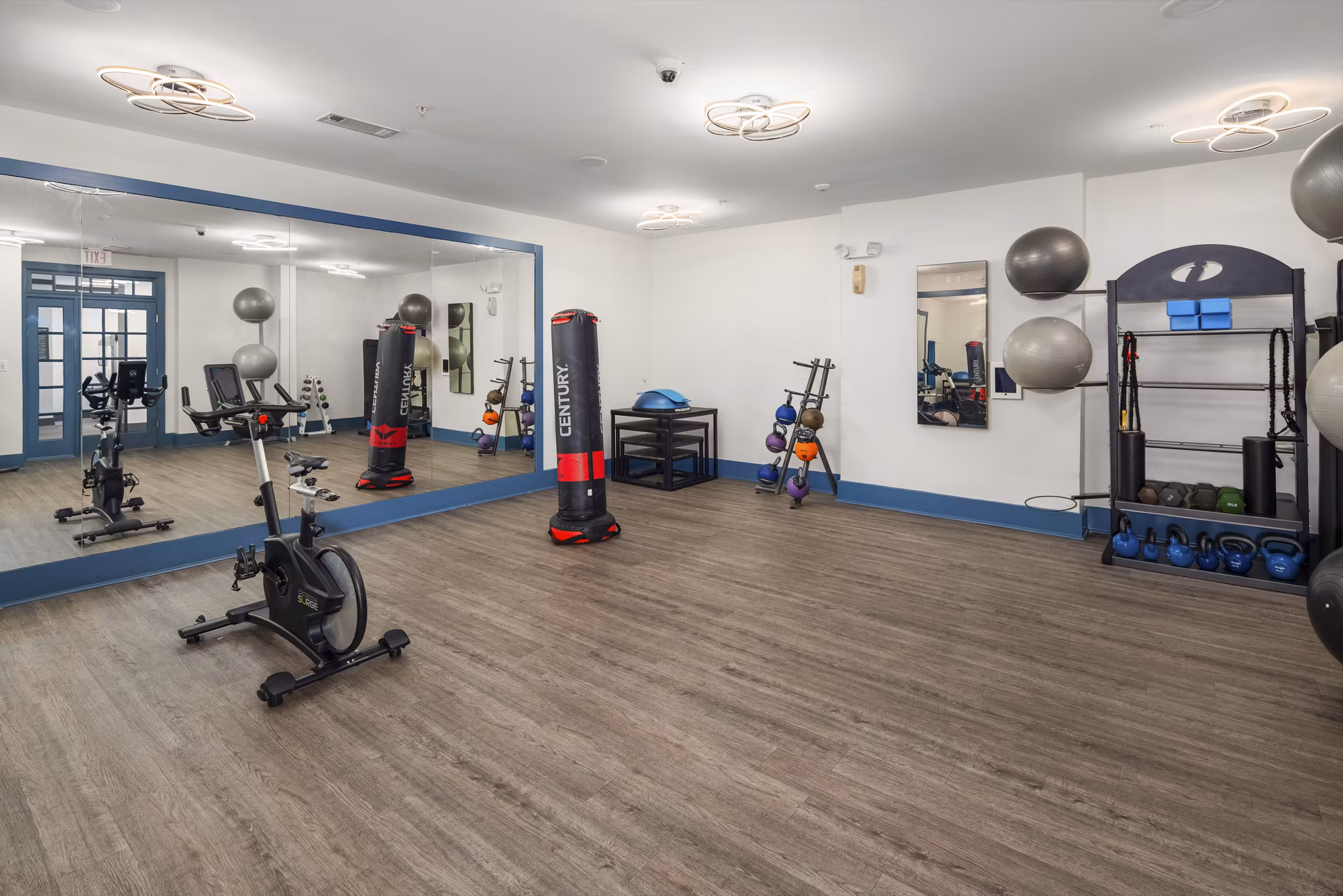 Modern fitness center with advanced equipment at Avanti Brookhaven Apartments offering luxurious amenities for residents