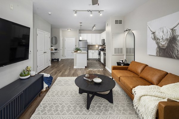 Living room with modern design and ample natural light at Avanti Brookhaven Apartments