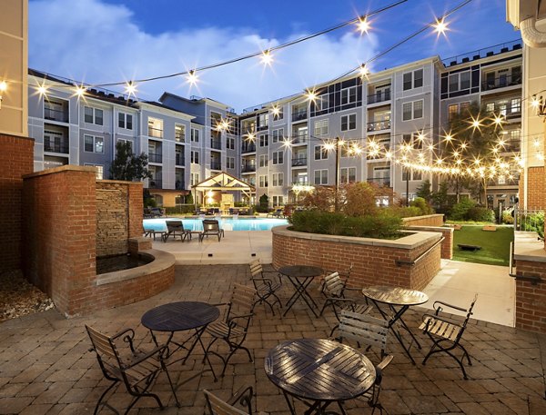 Patio with stylish outdoor seating at Avanti Brookhaven Apartments