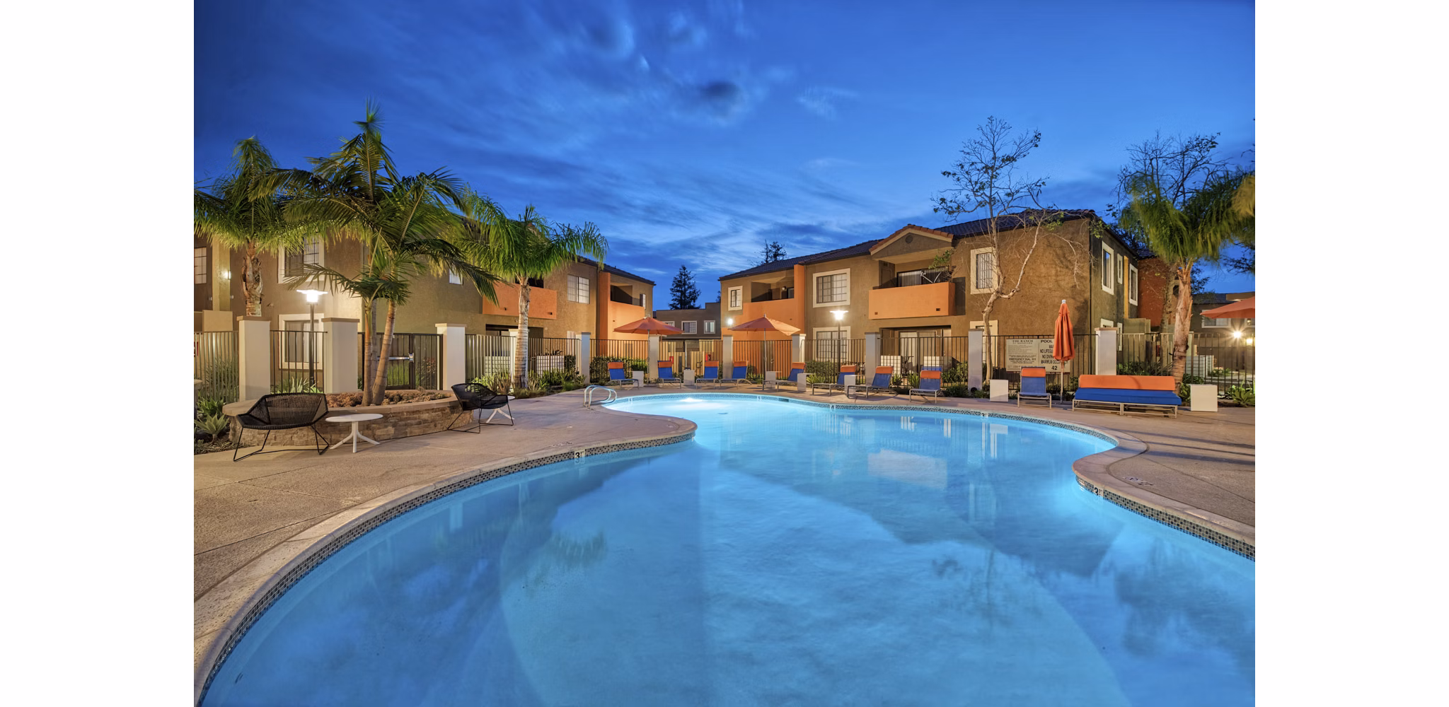 Resort-style pool with spacious sun deck at The Ranch at Moorpark Apartments, perfect for relaxing and socializing in luxury settings