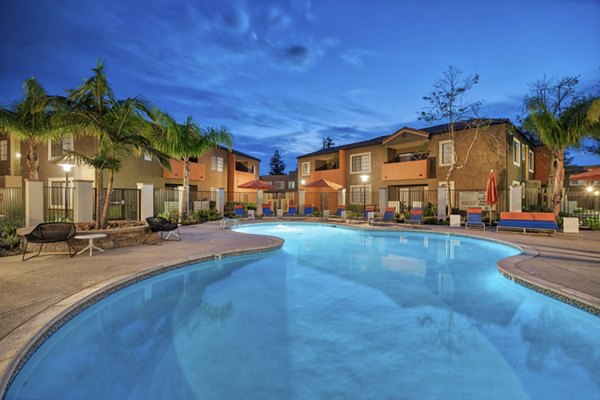 Resort-style pool with spacious sun deck at The Ranch at Moorpark Apartments, perfect for relaxing and socializing in luxury settings