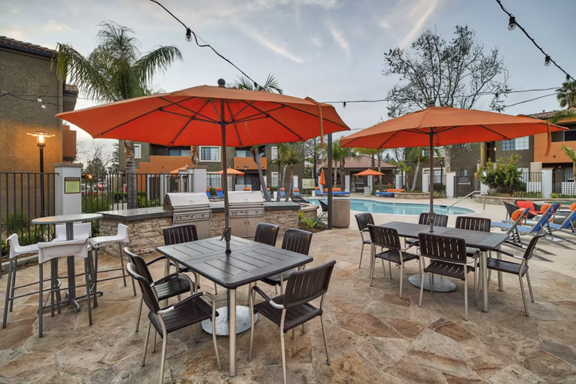 Grilling area with modern barbecue stations at The Ranch at Moorpark Apartments