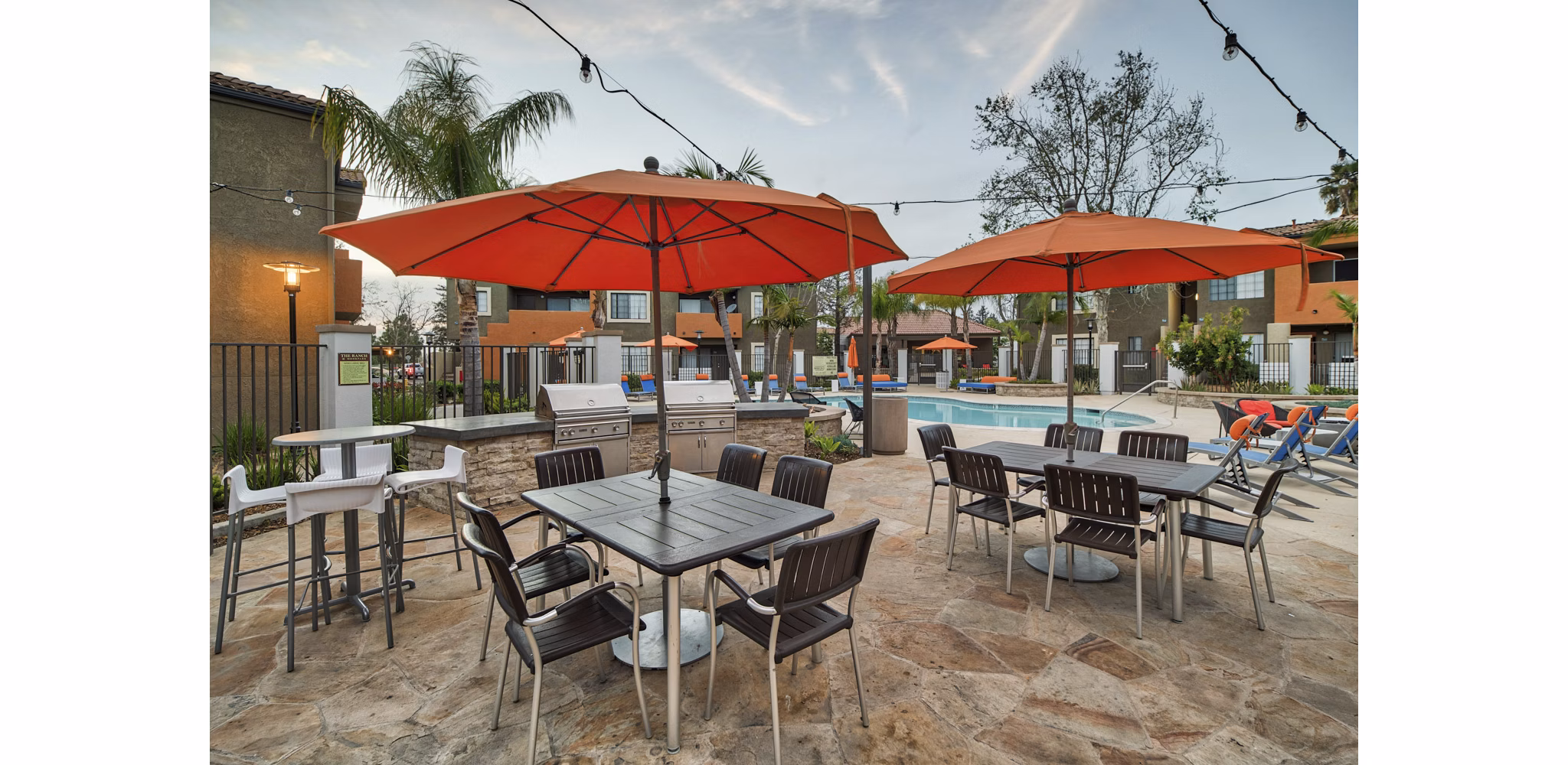 Grilling area with modern barbecue stations at The Ranch at Moorpark Apartments