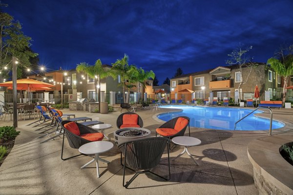 Fire pit surrounded by cozy seating at The Ranch at Moorpark Apartments, creating a warm outdoor gathering space