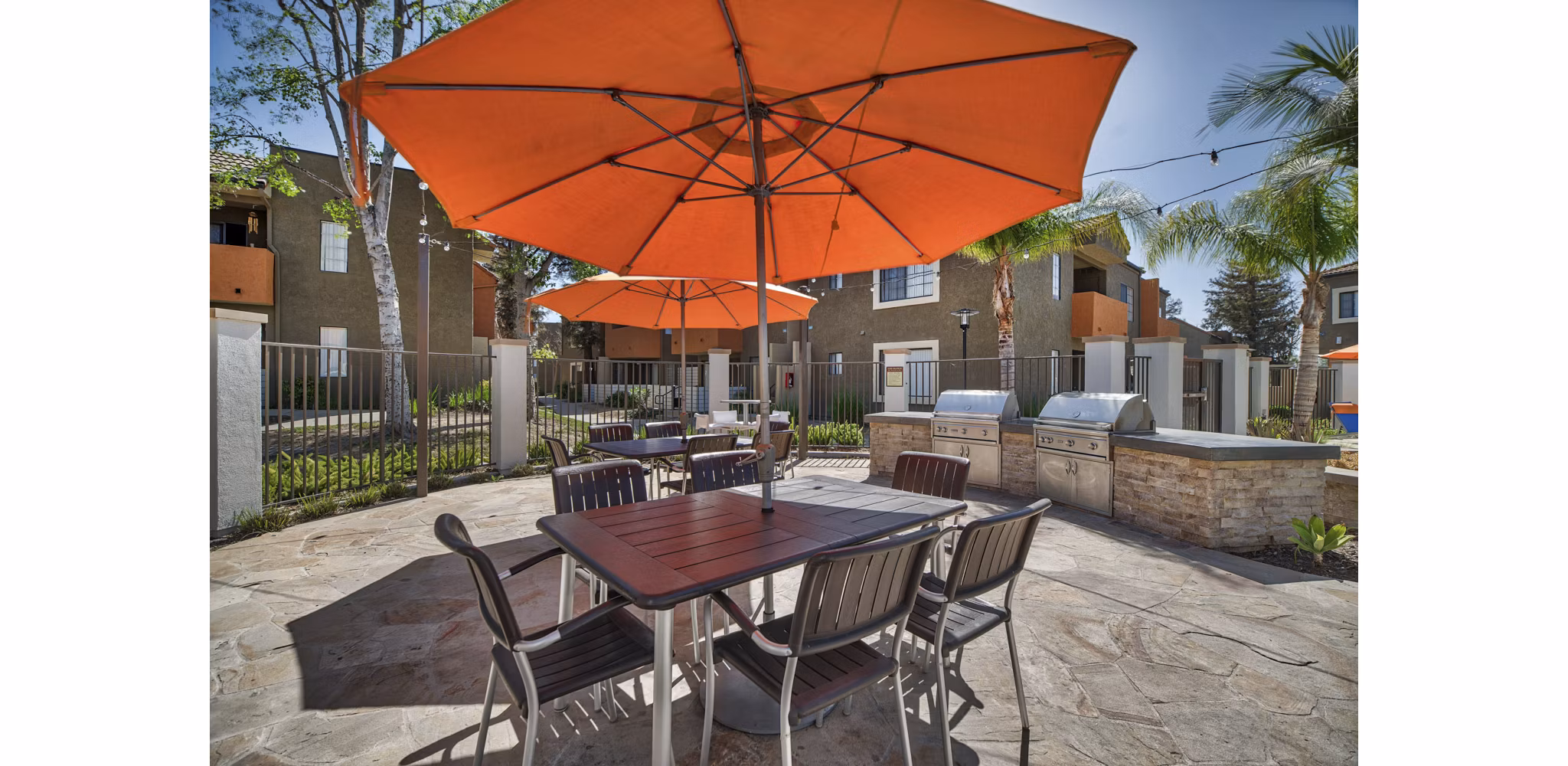 Grill area with outdoor seating at The Ranch at Moorpark Apartments