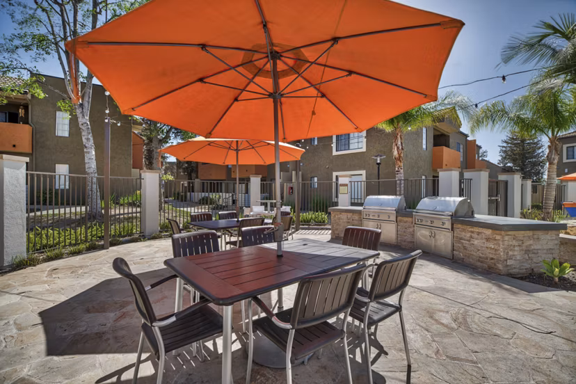 Grill area with outdoor seating at The Ranch at Moorpark Apartments