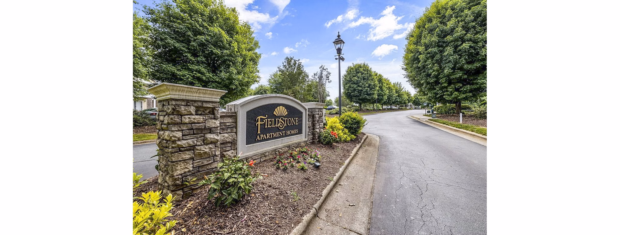 Fieldstone Apartment Homes: Elegant signage display for luxury living experience