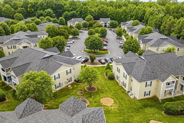 Fieldstone Apartment Homes: Elegant building set amidst lush greenery