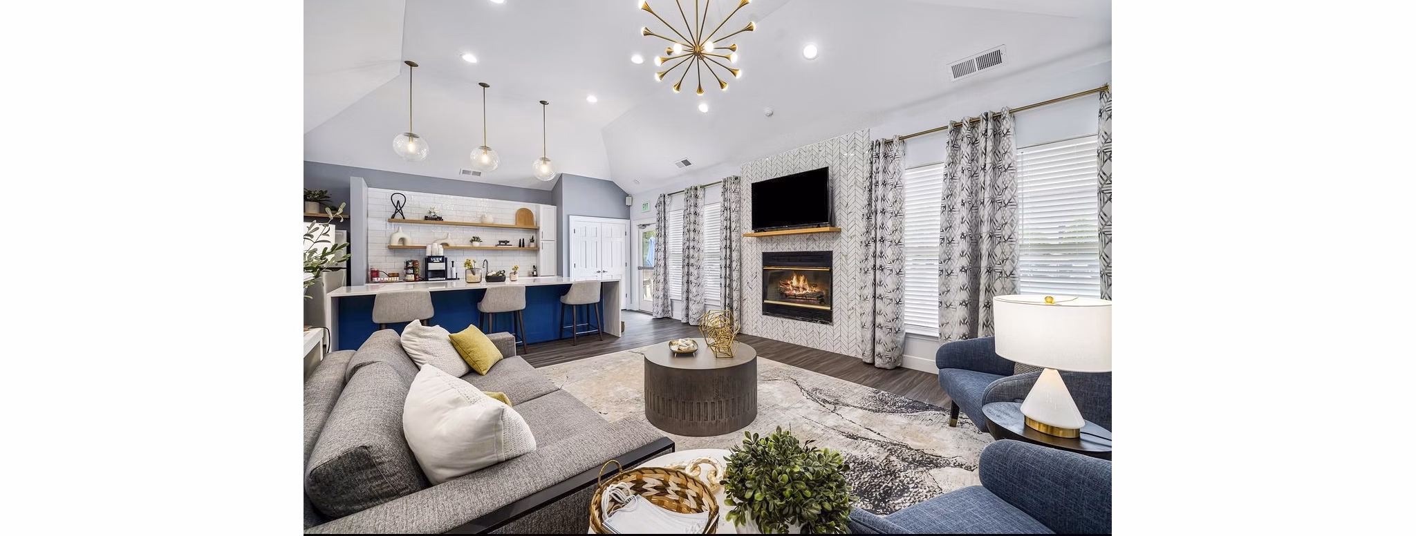 Clubhouse with modern seating and entertainment facilities at Fieldstone Apartment Homes, offering luxury living spaces