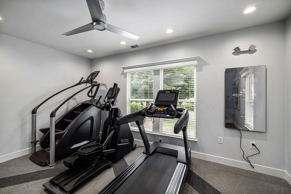 Modern fitness center with state-of-the-art equipment at Fieldstone Apartment Homes