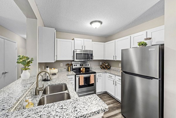 Spacious kitchen with modern appliances at Fieldstone Apartment Homes Ideal for luxury living and culinary activities
