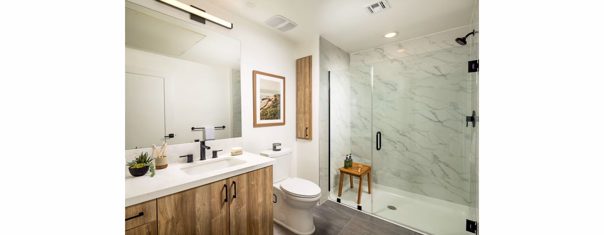 Luxurious bathroom with modern fixtures at Triton Encinitas Apartments