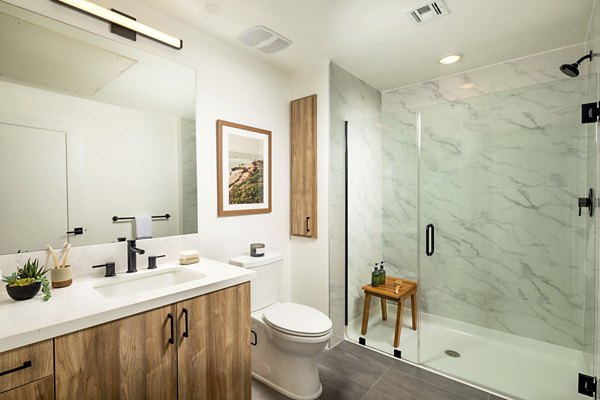 Luxurious bathroom with modern fixtures at Triton Encinitas Apartments