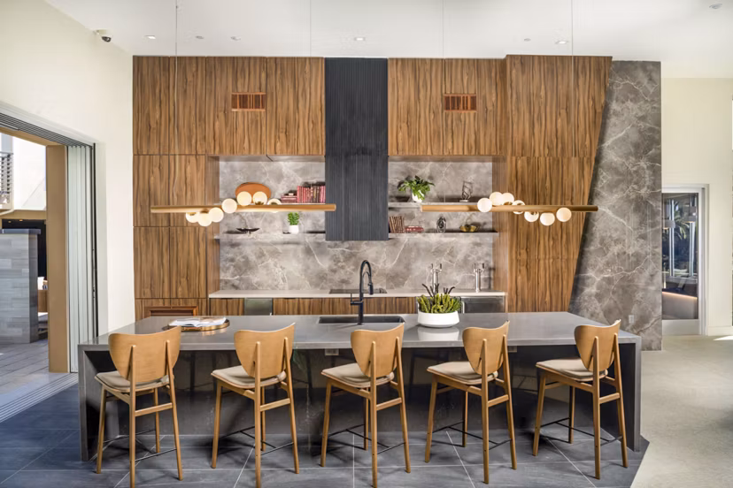 Modern clubhouse with lounge seating at Triton Encinitas Apartments, showcasing luxury amenities in coastal California living