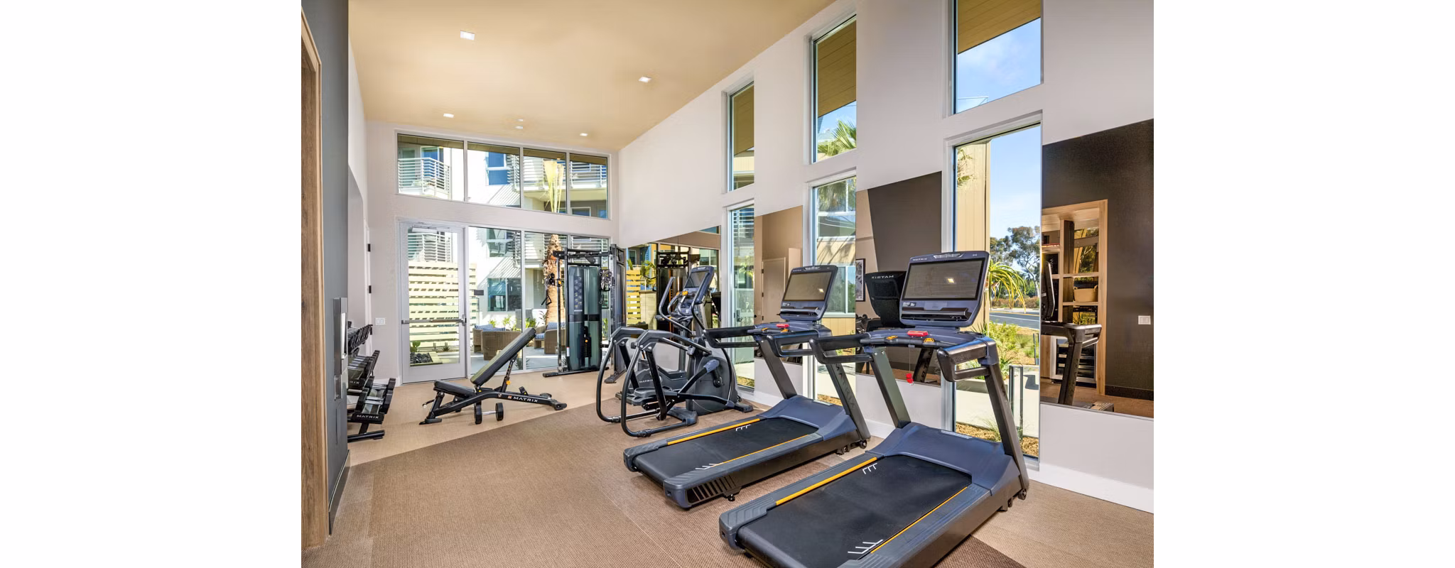 Fitness center featuring state-of-the-art equipment at Triton Encinitas Apartments
