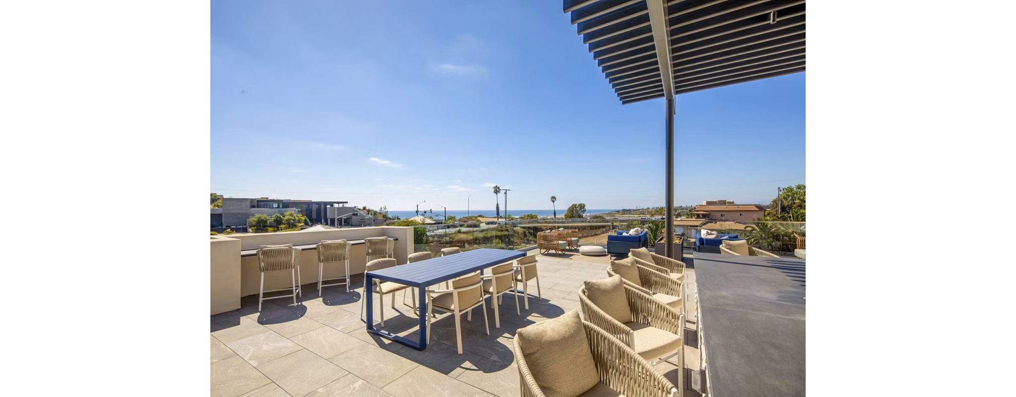 Spacious patio with stylish seating at Triton Encinitas Apartments, perfect for relaxing and enjoying views in luxury