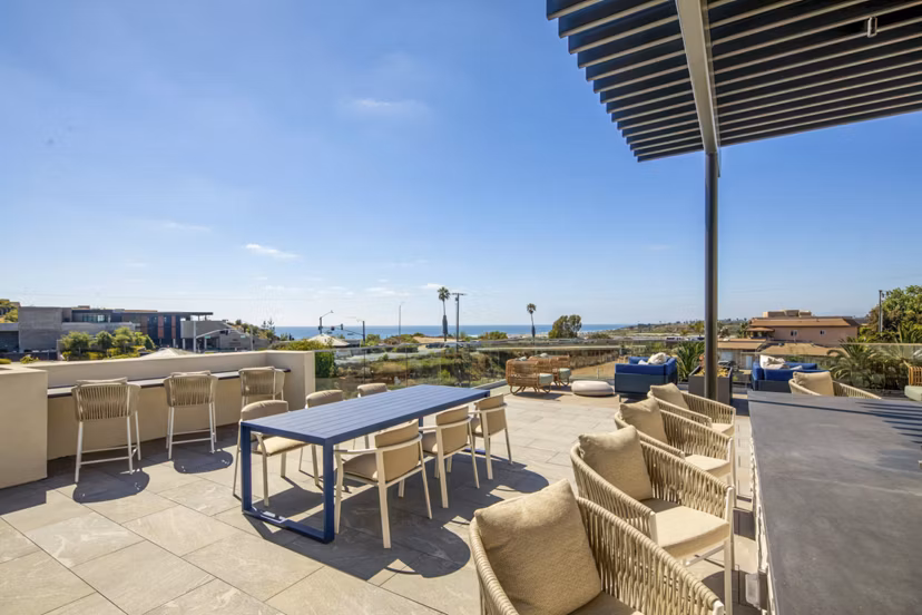 Spacious patio with stylish seating at Triton Encinitas Apartments, perfect for relaxing and enjoying views in luxury