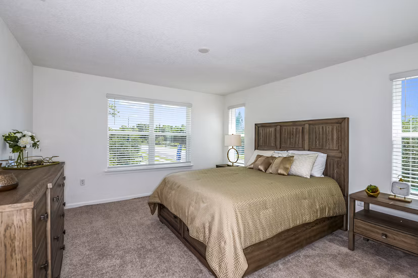 Cozy bedroom with elegant decor in Alexander Park Apartments