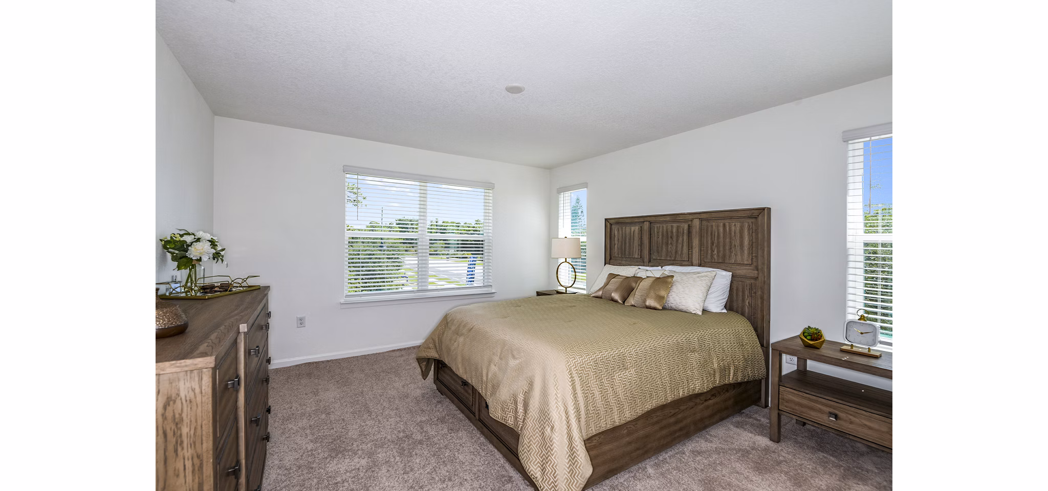 Cozy bedroom with elegant decor in Alexander Park Apartments
