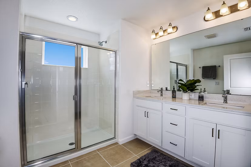 Modern bathroom with elegant fixtures at Alexander Park Apartments in Greystar community