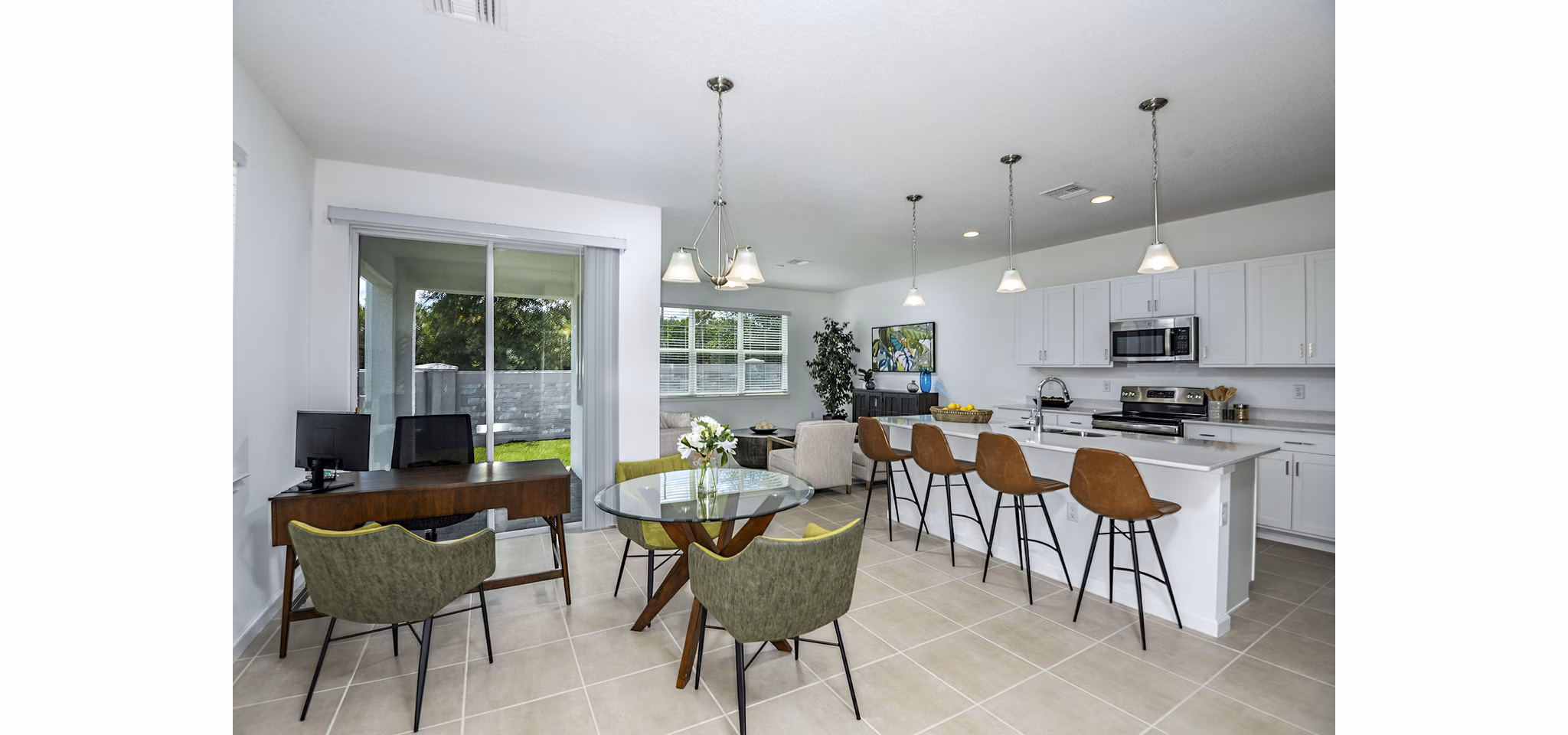 Dining room/home office featuring modern furnishings and elegant lighting in Alexander Park Apartments