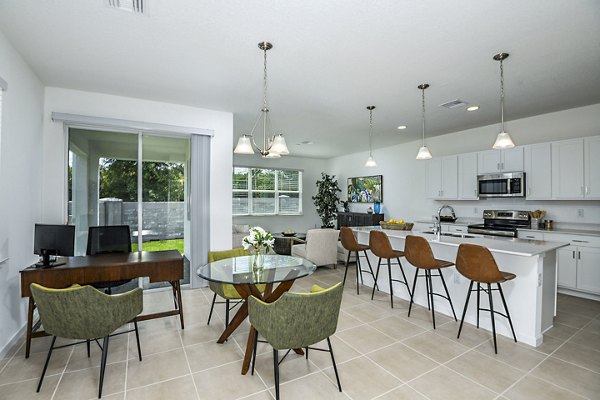 Dining room/home office featuring modern furnishings and elegant lighting in Alexander Park Apartments