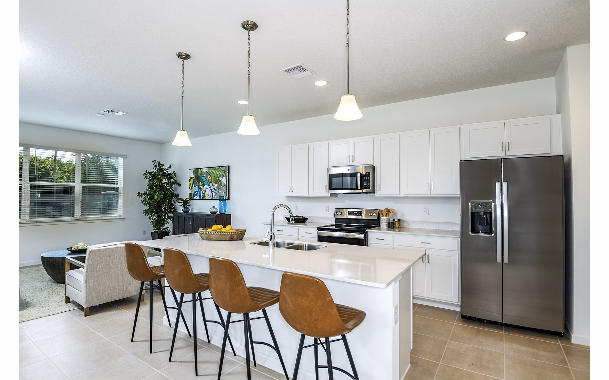 Modern kitchen with stainless steel appliances at Alexander Park Apartments