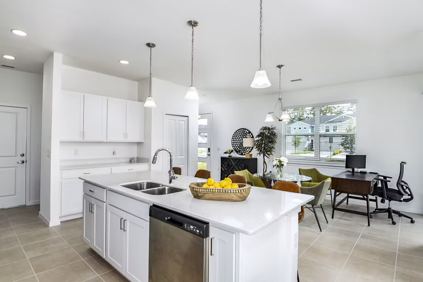Modern kitchen with stainless steel appliances in Alexander Park Apartments, a luxury Greystar property