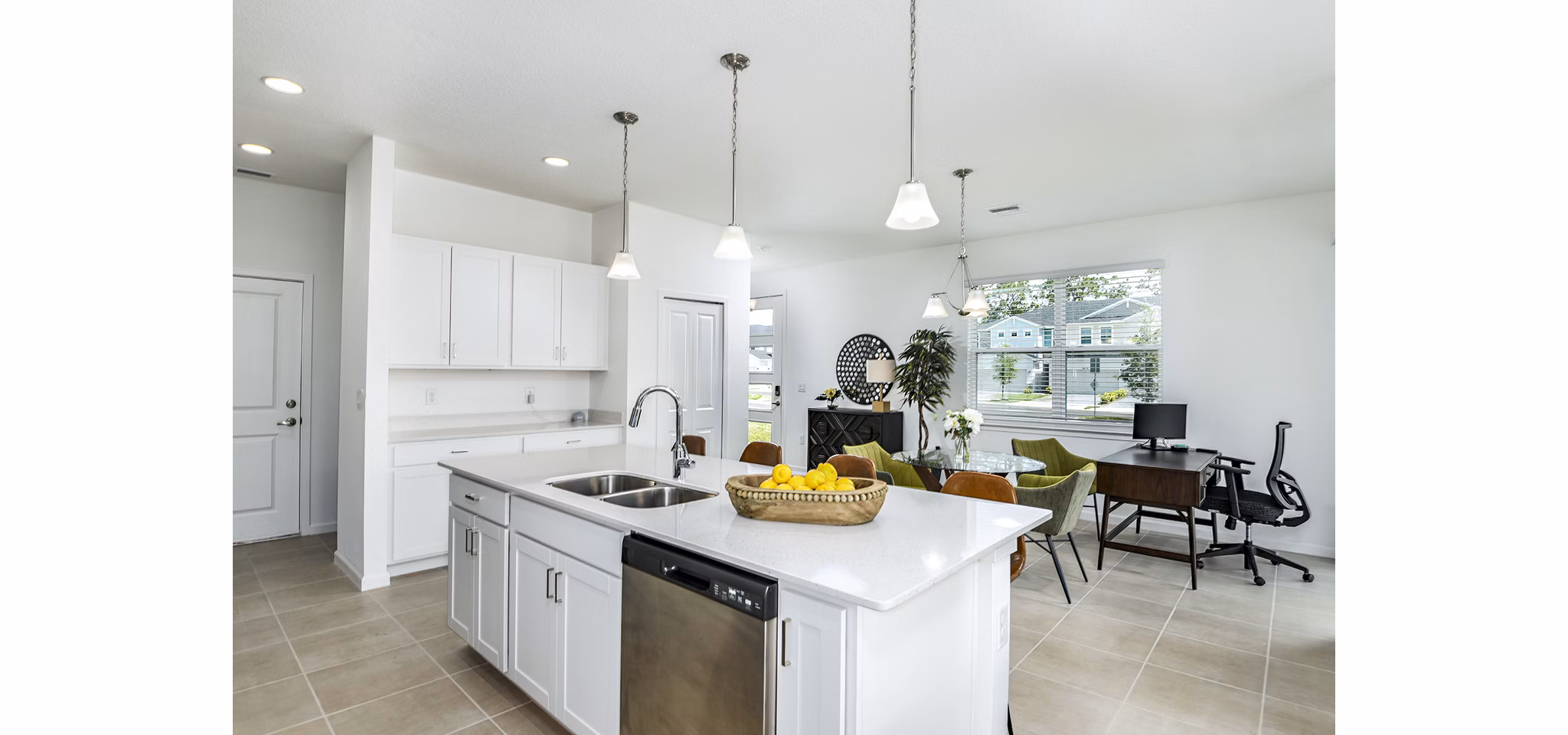 Modern kitchen with stainless steel appliances in Alexander Park Apartments, a luxury Greystar property