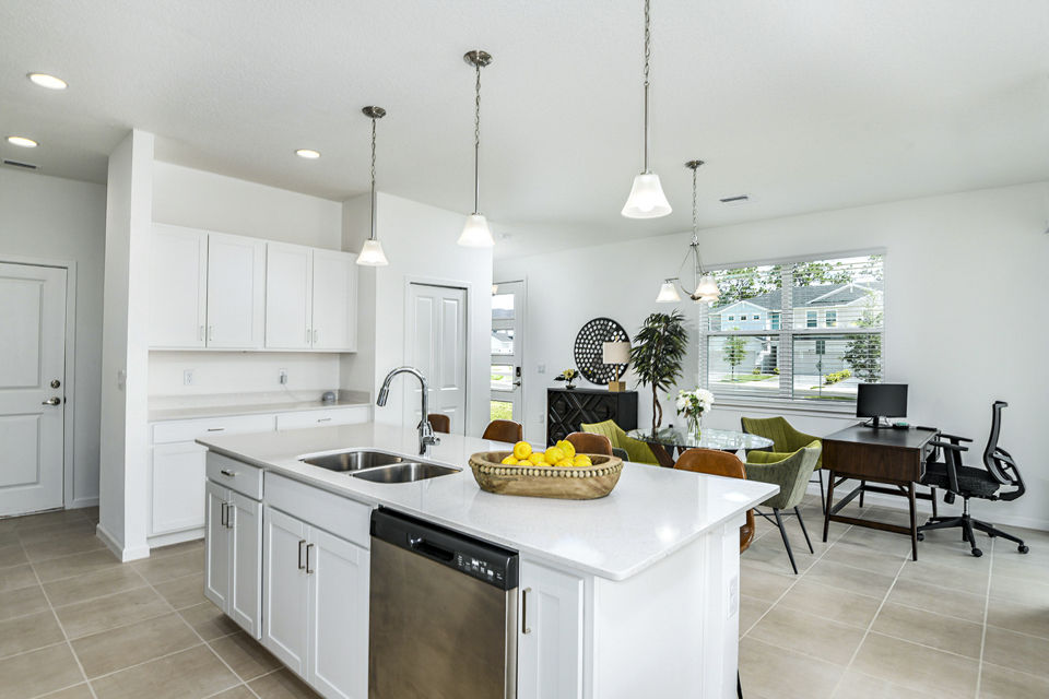Modern kitchen with stainless steel appliances in Alexander Park Apartments, a luxury Greystar property