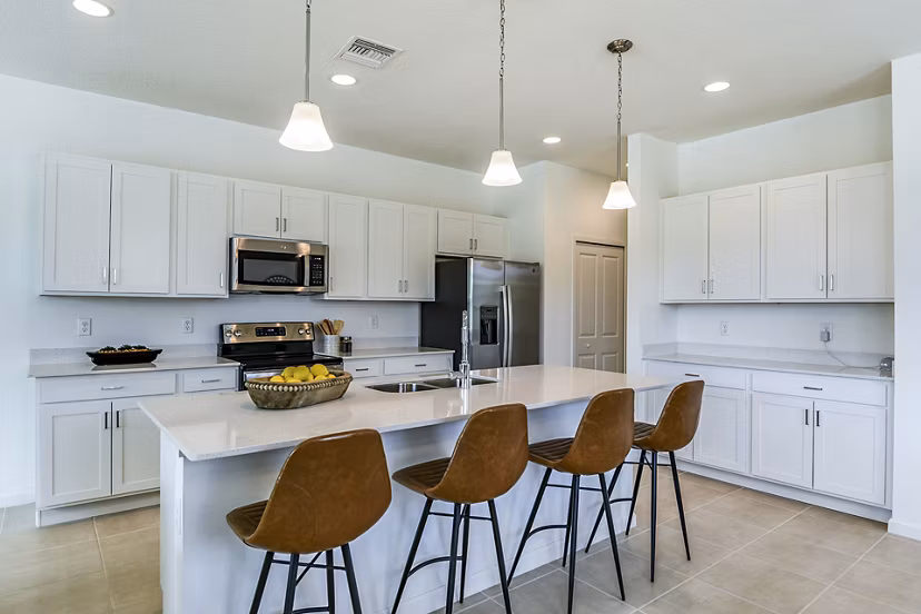 Modern kitchen with stainless steel appliances at Alexander Park Apartments