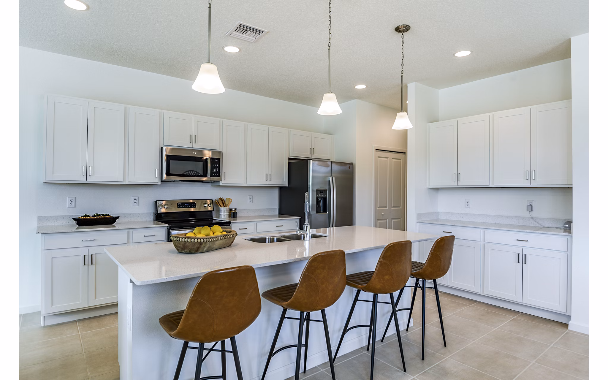 Modern kitchen with stainless steel appliances at Alexander Park Apartments