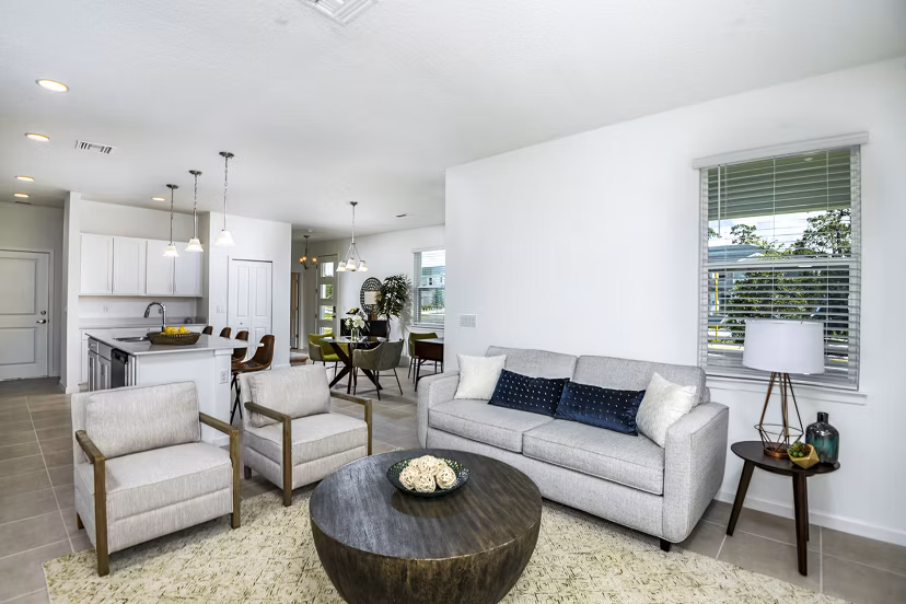 Living room with modern decor and natural light at Alexander Park Apartments