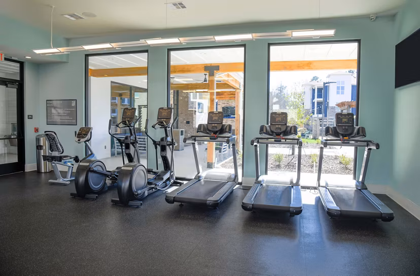 fitness center at The Waters at Hammond Apartments