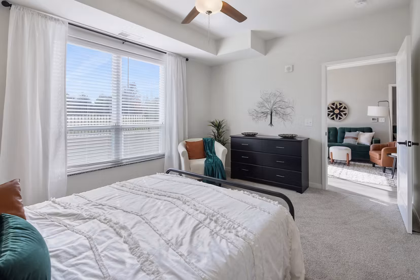 Cozy bedroom with modern decor at Arasan Apartments