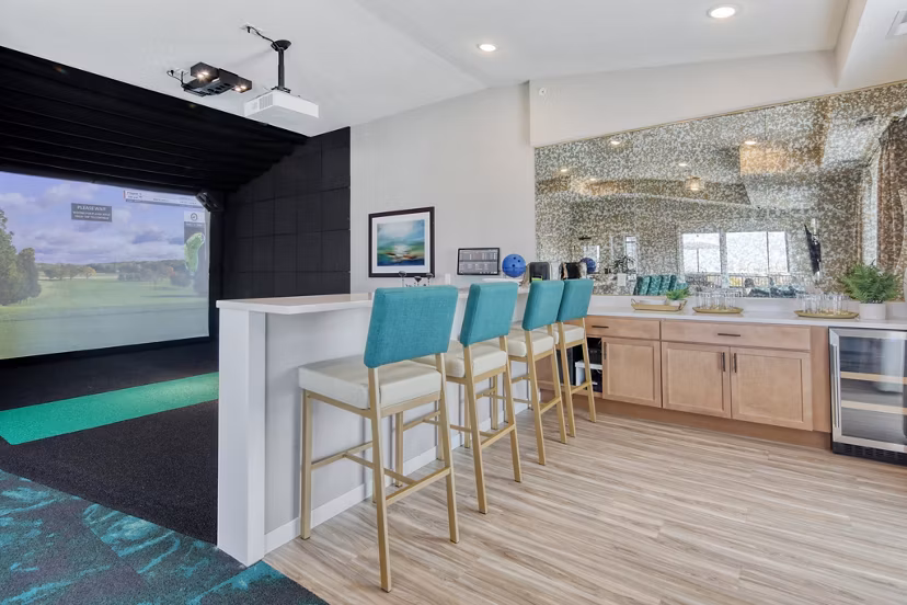 Contemporary clubhouse with lounge seating and modern design at Arasan Apartments